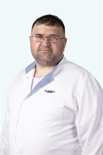 Гусейнов Исмаил Гасанович - оториноларинголог, гортанный хирург